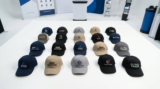 Assorted custom branded baseball caps and embroidered hats for trade shows and corporate events