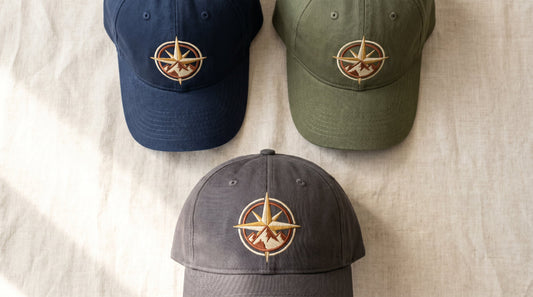 Professional flat lay of custom embroidered baseball caps showing decoration detail