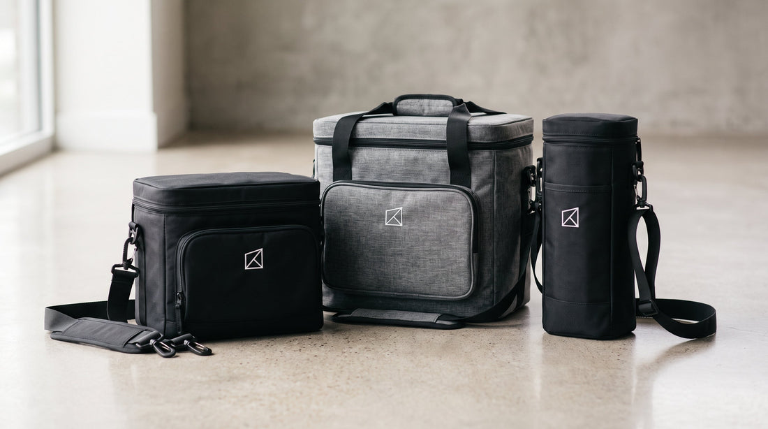 Three custom coolers with logo embroidery — a 12-can soft cooler, a collapsible 24-can cooler and a slim cooler sling for corporate gift programs
