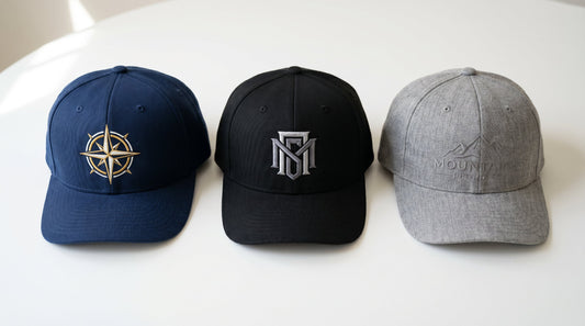 Wholesale embroidered caps flat lay — custom embroidered hats for business